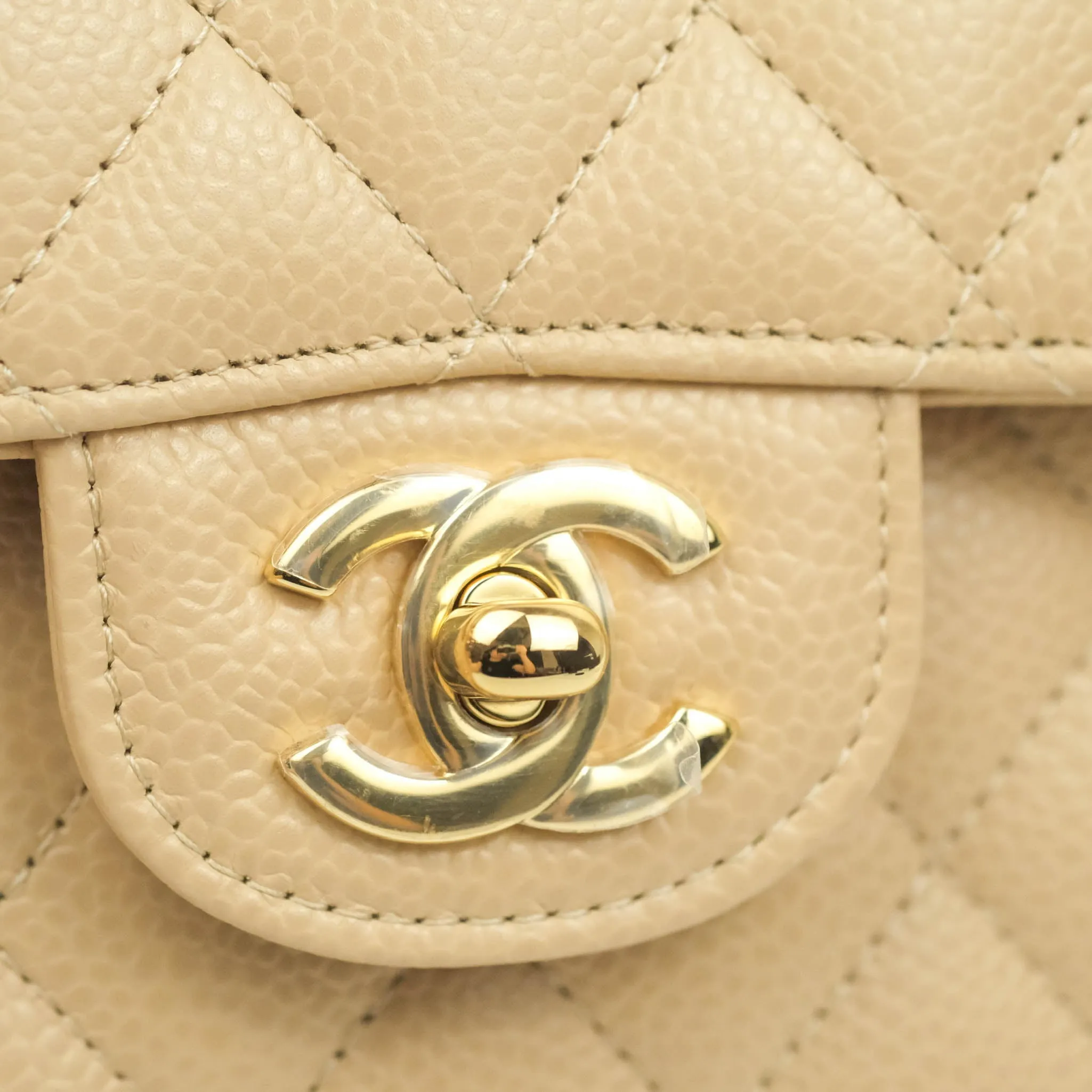Chanel Classic Small S/M Quilted Flap Beige Caviar Gold Hardware