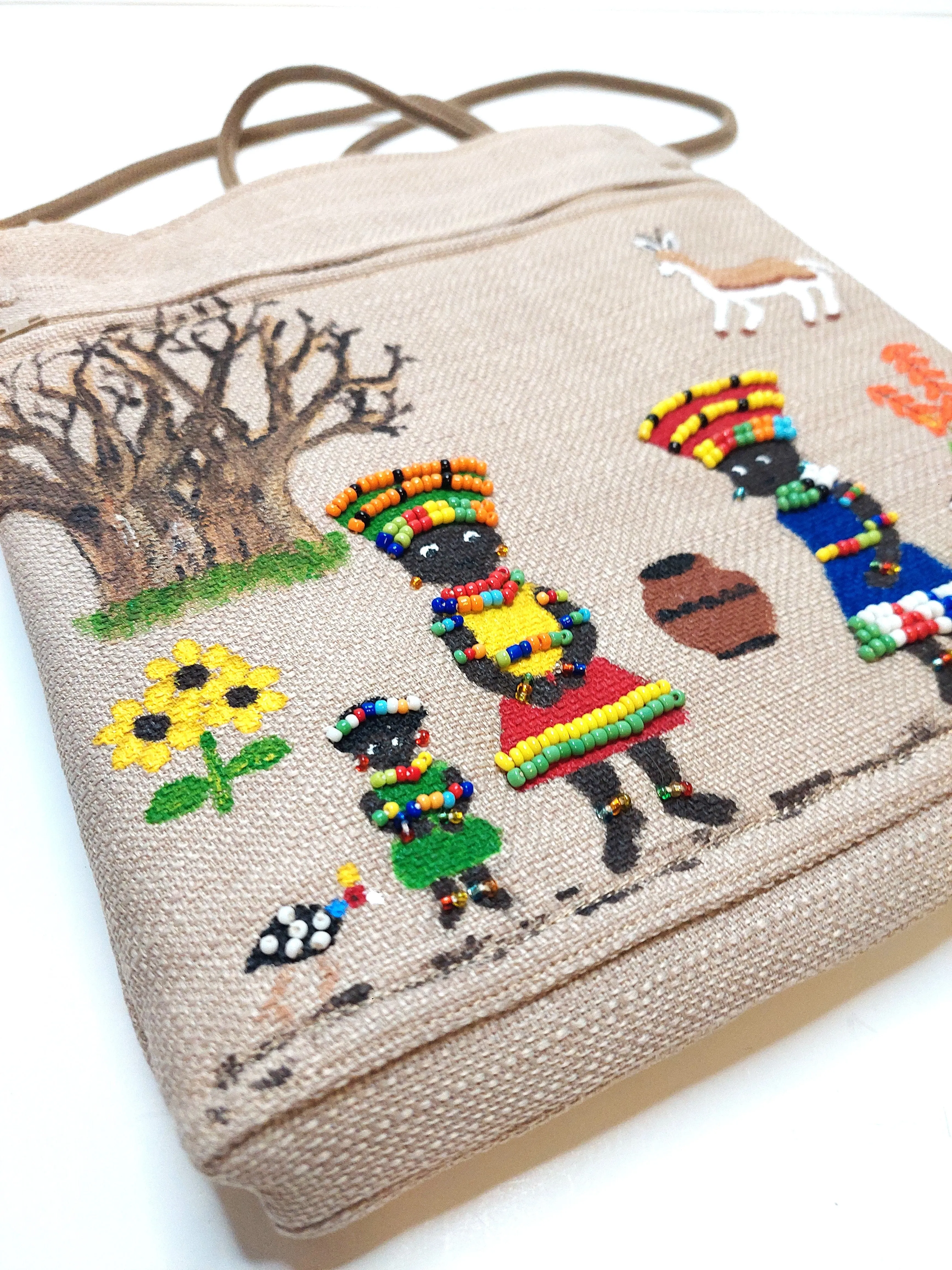 large beaded, hand painted sling bag lined with shweshwe